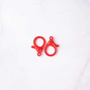 BROCHE PICO DE LORO ACRILICO ROJO